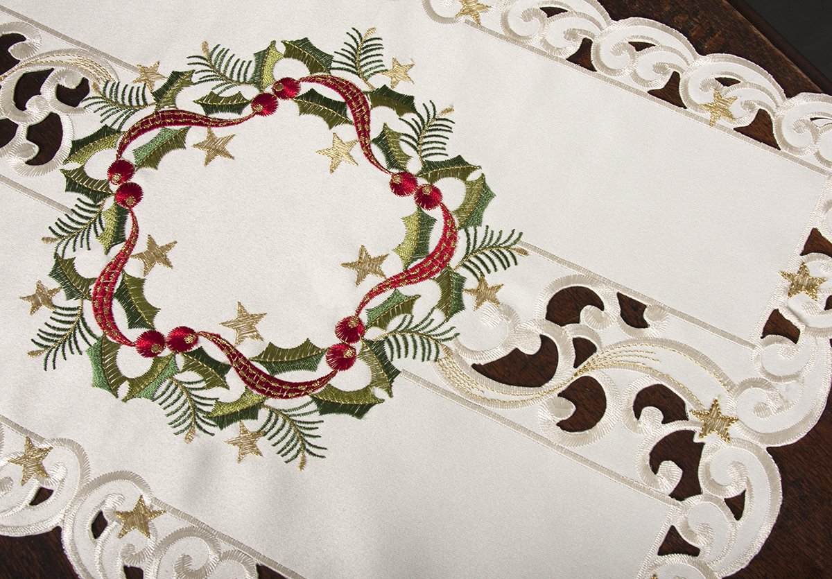 Set of 4 XD17103 Ribbon Wreath Placemats featuring embroidered Christmas holly wreaths on ivory cutwork, perfect for holiday dining.