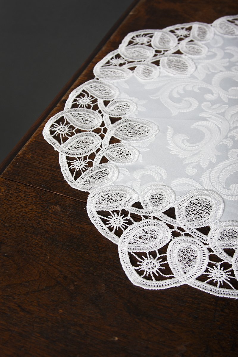 Set of 4 XD17190 Antebella Lace Placemats featuring intricate cutwork and elegant floral designs on pure white fabric.