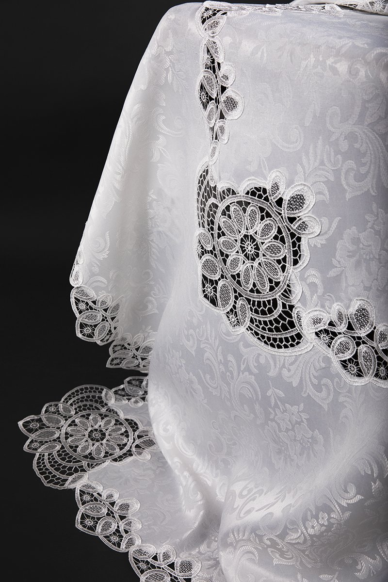 XD17190 Antebella Lace Tablecloth featuring intricate cutwork lace and scrolling damask florals in pure white.