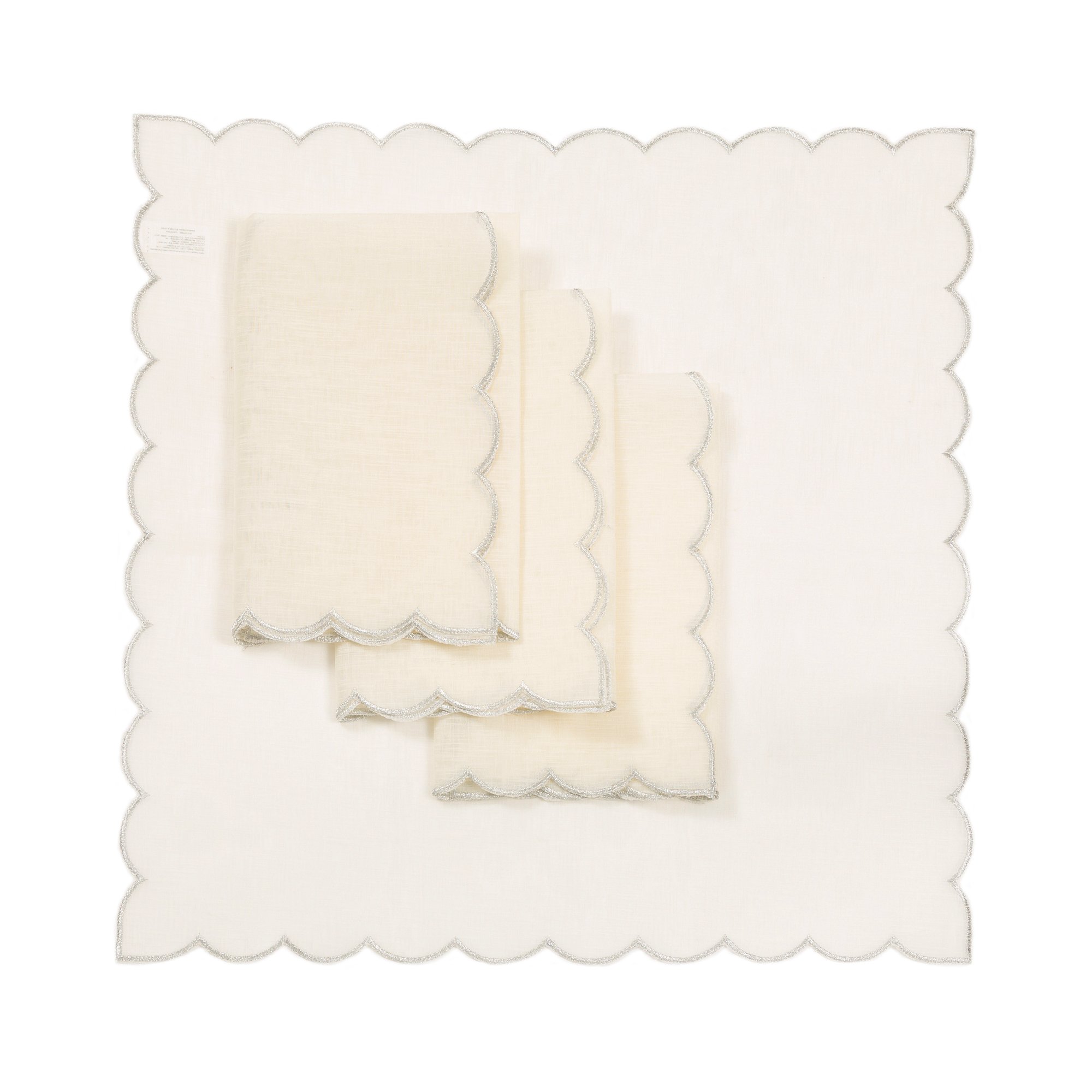 Set of 4 XD18265B Sleek Chic Sheer Napkins with shimmering gold or silver trim, elegantly displayed on a dining table.