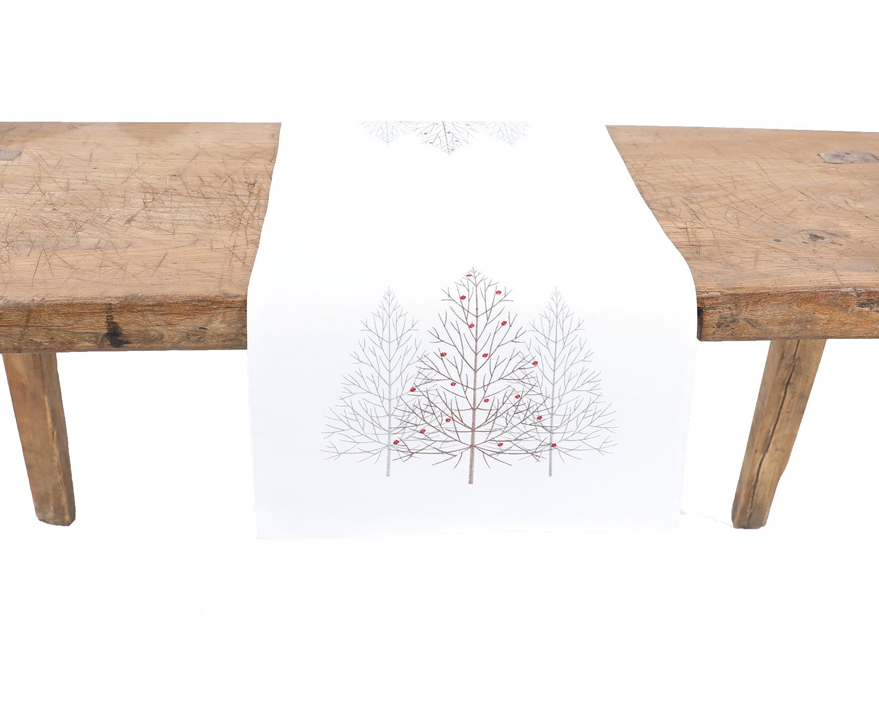 XD19803 Festive Trees Embroidered Christmas Table Runner featuring white Christmas trees and winter berries on a white background.