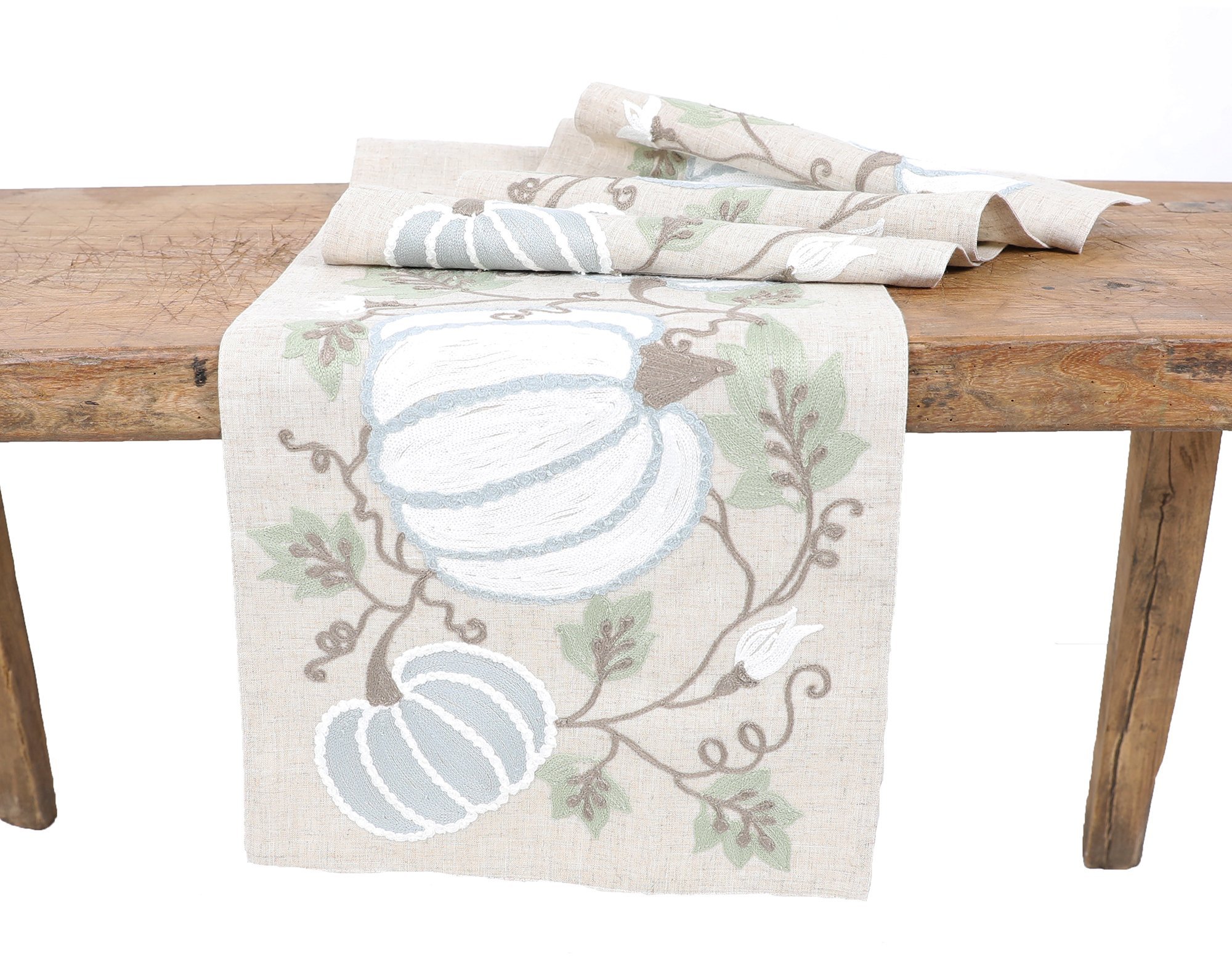 Harvest Pumpkins and Vines Crewel Embroidered Fall Table linens featuring intricate embroidery and a reversible design in blue, white, and green colors.