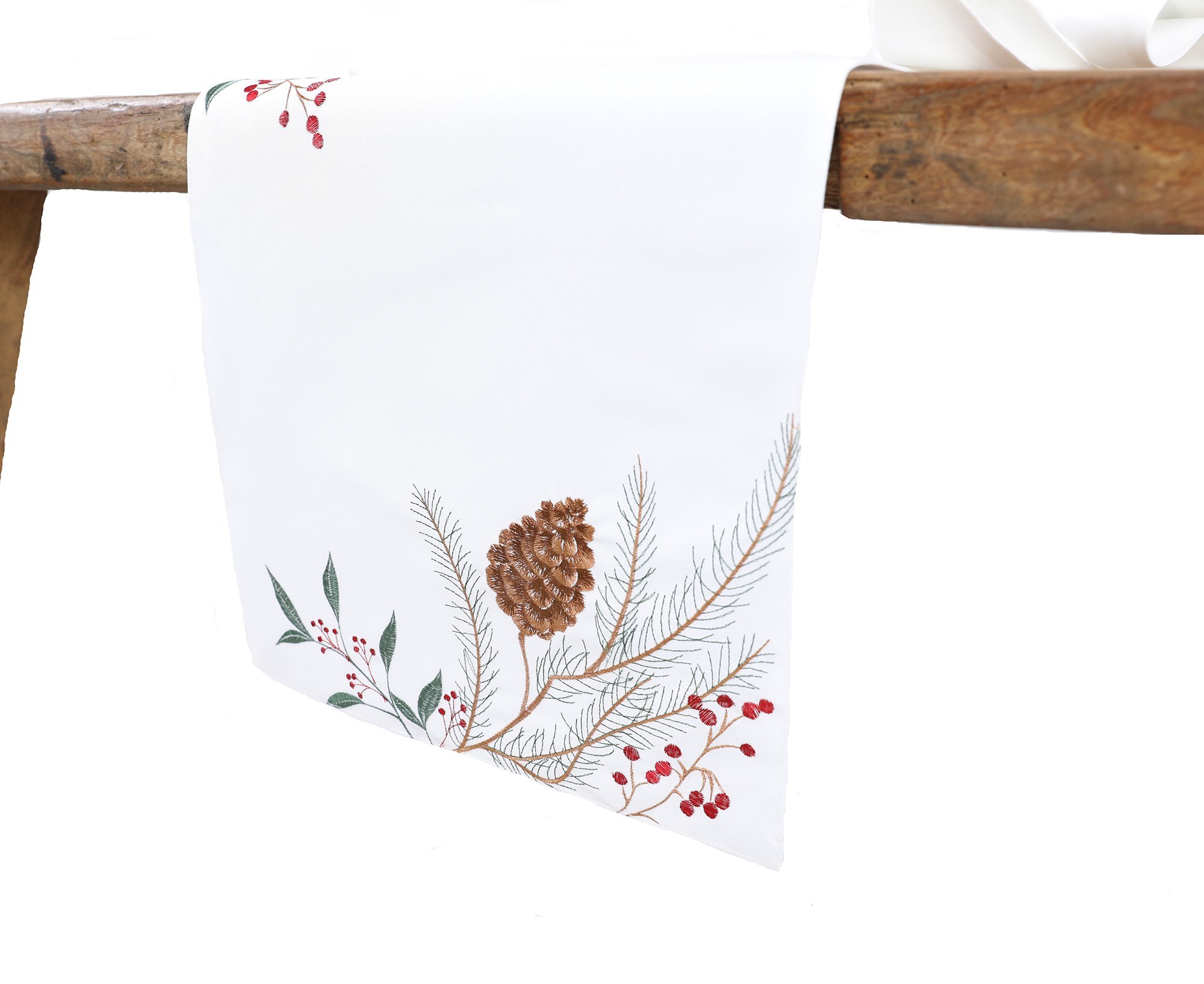 XD19819 Pinecone and Berry Embroidered Christmas Table Runner featuring intricate holiday designs on a white fabric background.