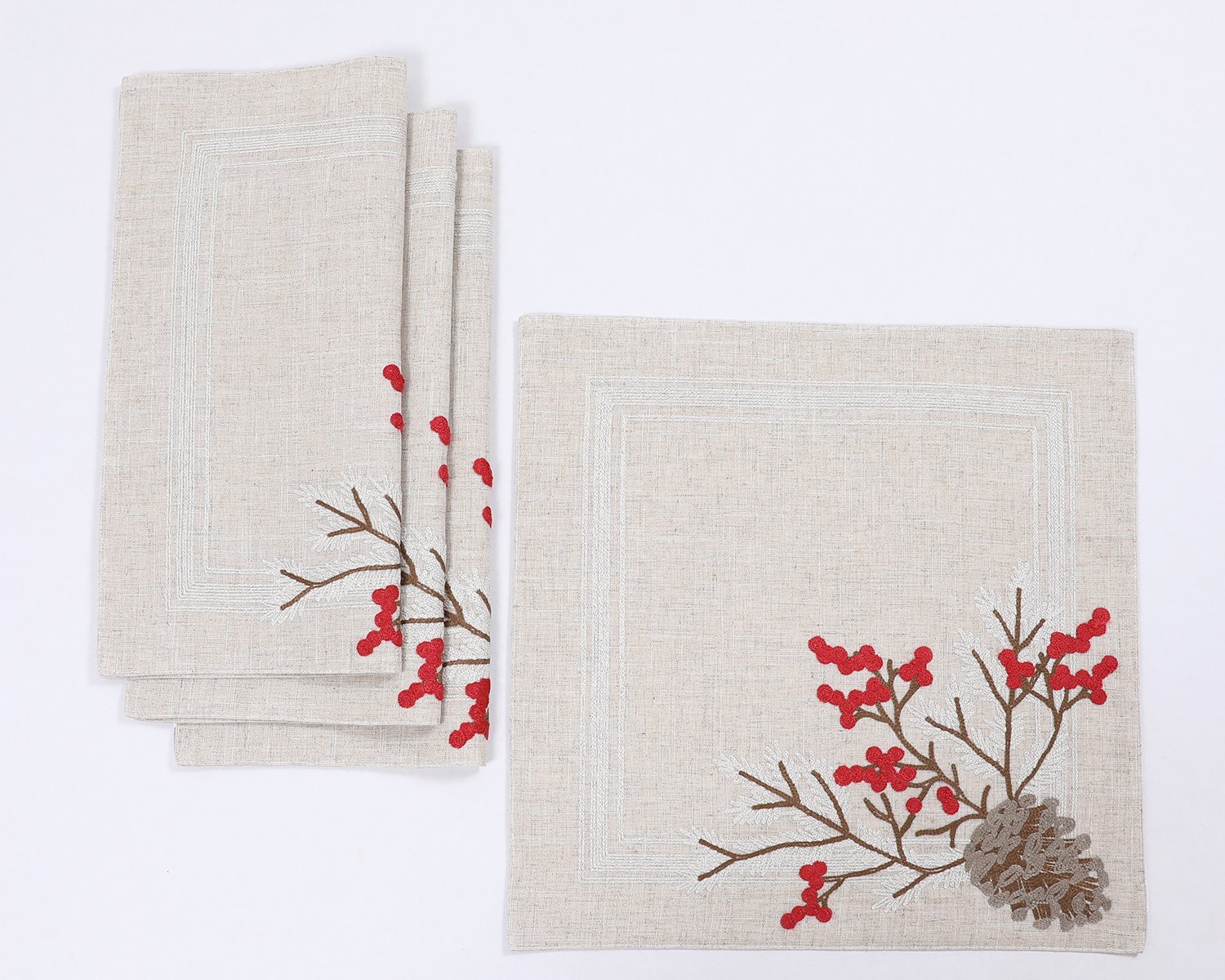 Christmas Pine Cone Crewel Embroidered Placemats featuring intricate pine cone and holly berry designs on natural linen blend fabric.