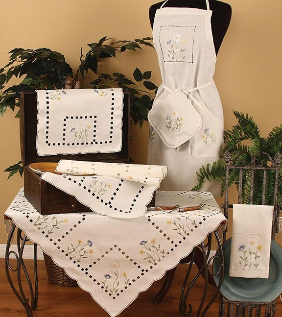 XD46114 Spring Field Collection featuring delicate floral embroidery and hand-rendered cutwork on elegant table linens.