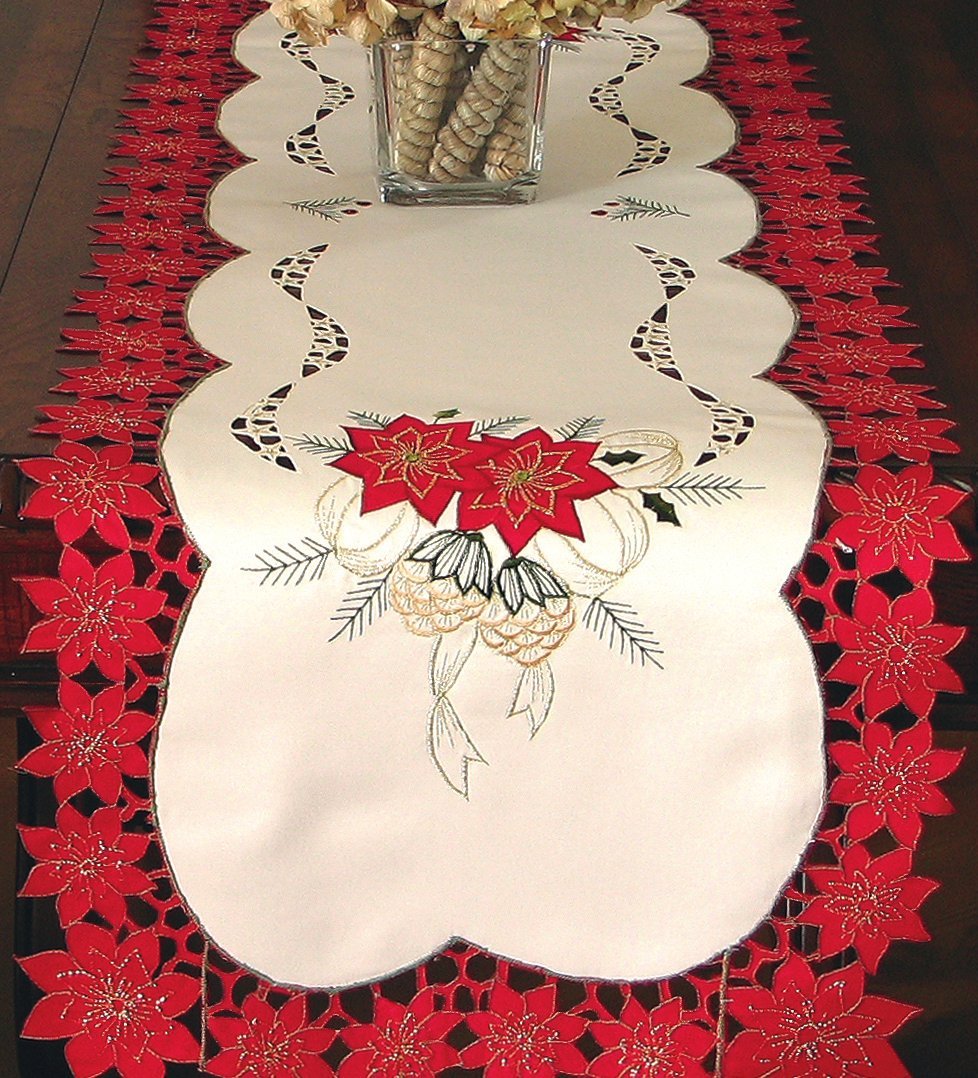 XD46227 Celebration Collection table linens featuring embroidered poinsettias and pinecones with a cutwork poinsettia border.