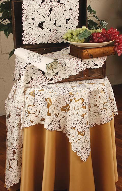 XD56864 Napa Collection table linens featuring elegant flower embroidery and hand-rendered cutwork, perfect for spring and summer dining.