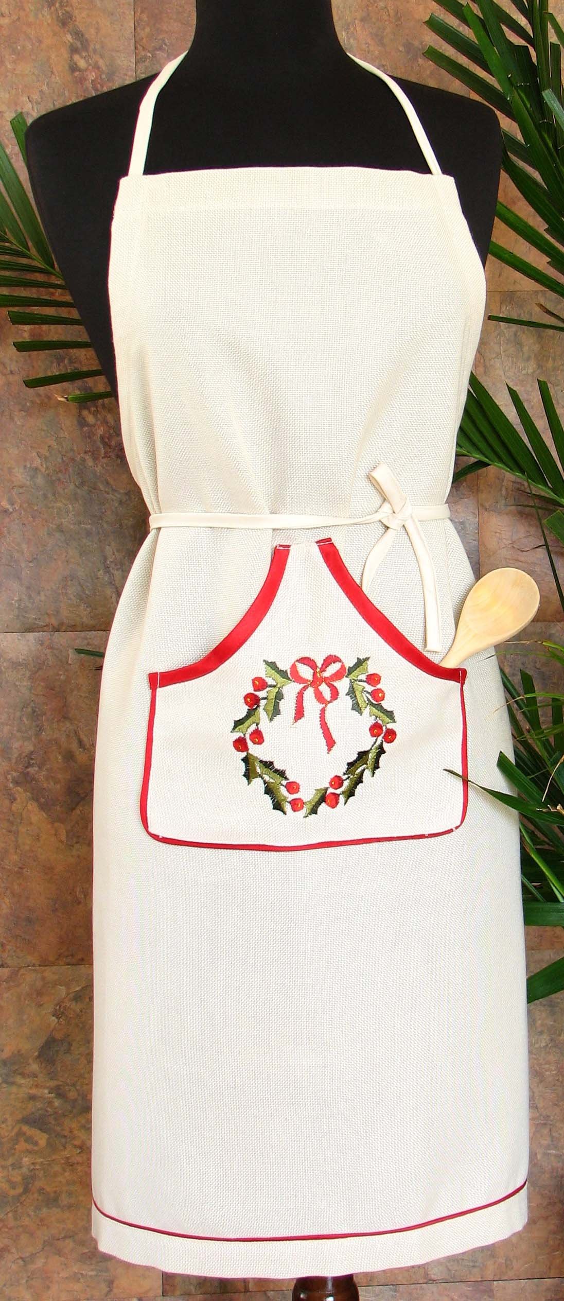 XD68022 Country Wreath Apron featuring holly leaves and berries embroidery, perfect for Christmas cooking.