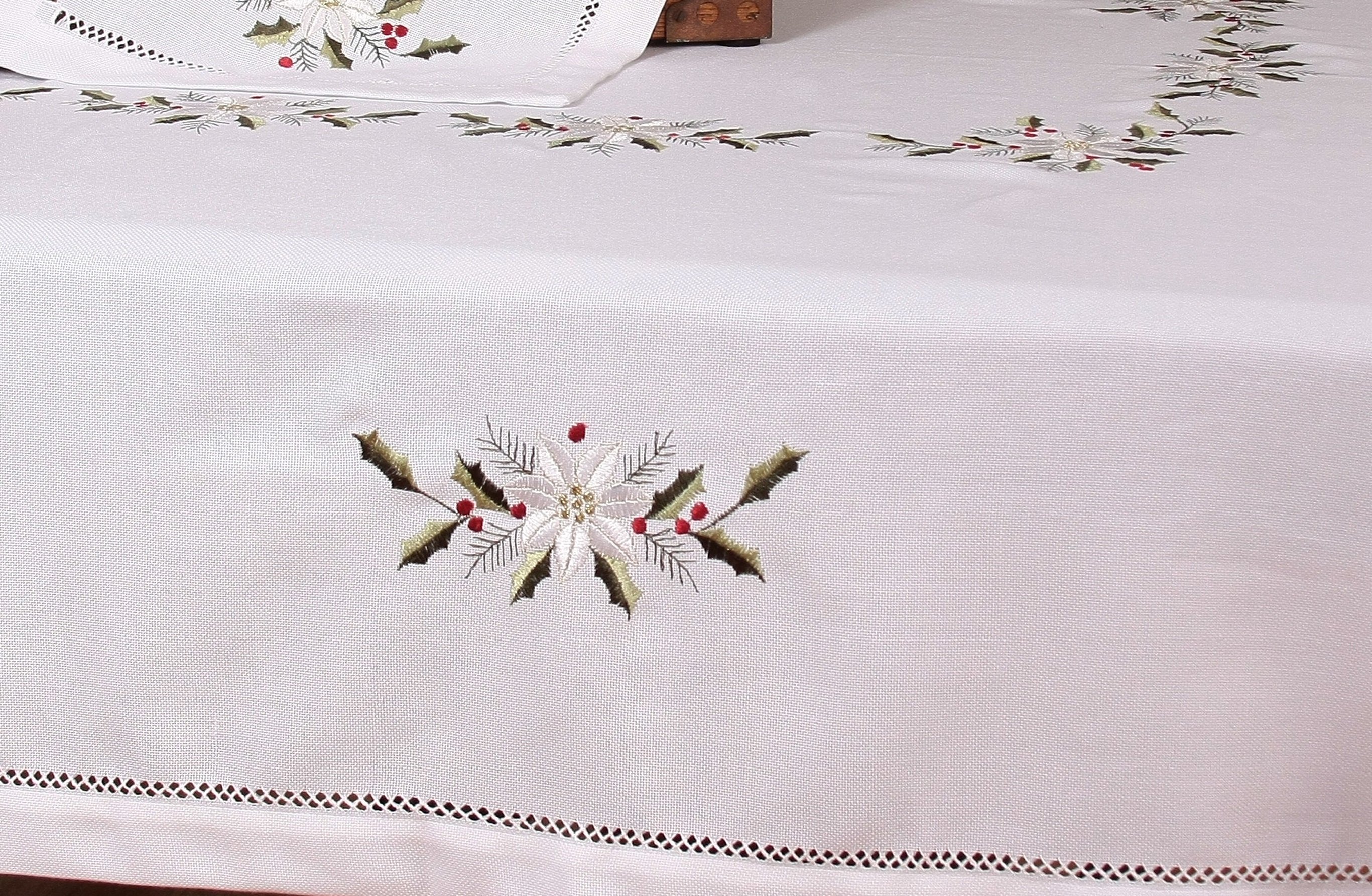 XD68036 Country Poinsettia Tablecloth featuring intricate embroidery of poinsettias and holly, perfect for Christmas dining.