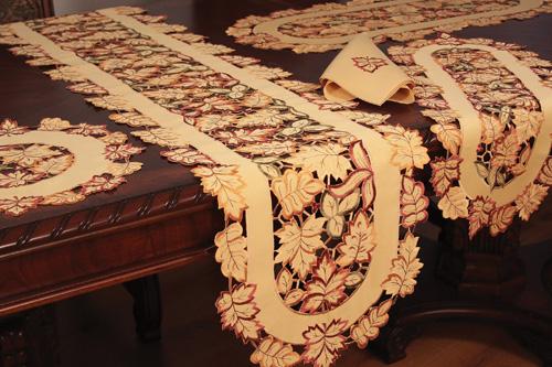 XD75018 Bountiful Leaf Table Runner featuring intricate autumn leaf embroidery in rich colors, perfect for harvest season decor.