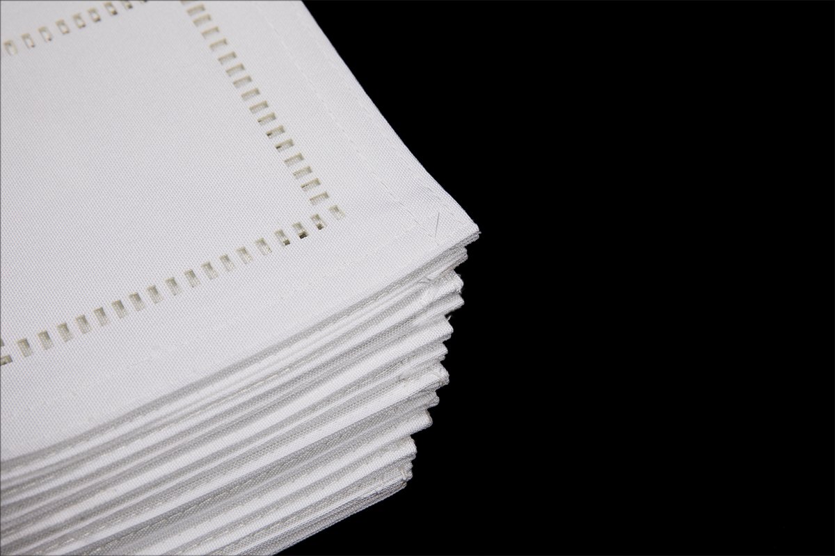 Set of 12 XD915918 Melrose Hemstitch Coasters in various colors, showcasing intricate hemstitch trim detail.