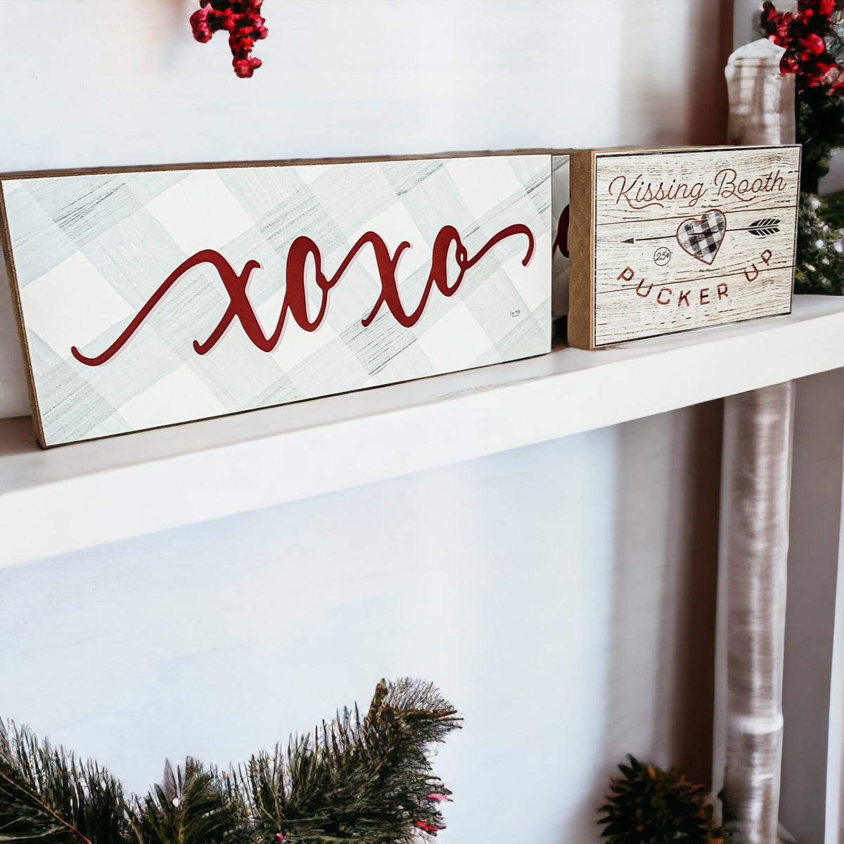 Handmade XOXO Sign made of thick wood with a light gray and white checkered background and darker red script, perfect for Valentine's Day decor.