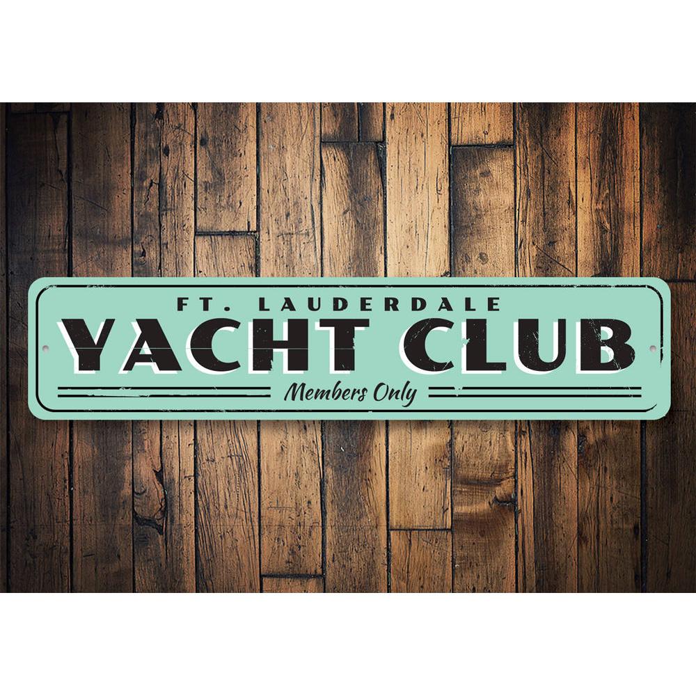 A beautifully crafted Yacht Club Sign made of high-quality aluminum, featuring customizable text and a coastal design, perfect for beach houses and decor.