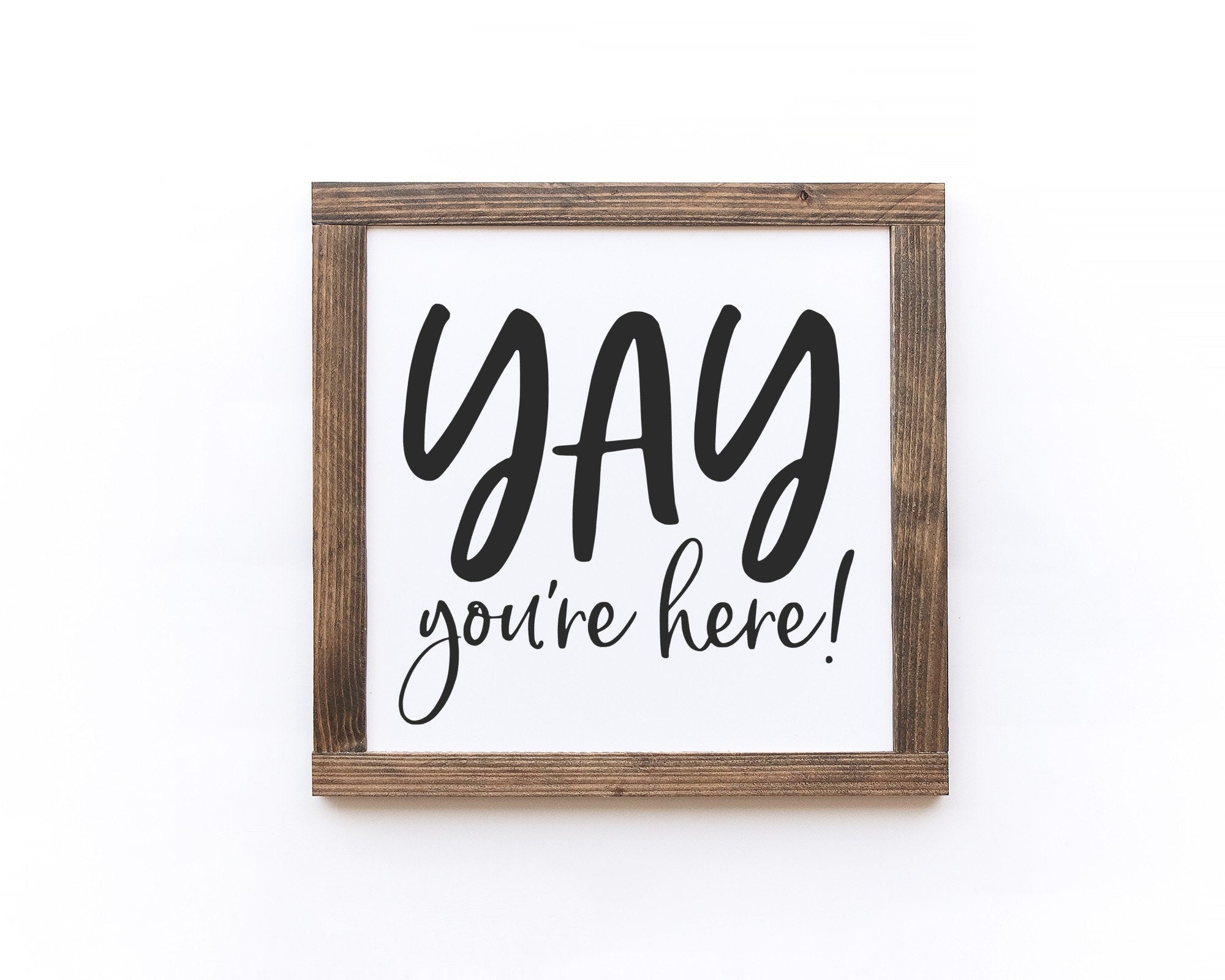 Yay You're Here Wood Sign, 11x11 inches, handmade with a matte white background and painted lettering, perfect for home decor.