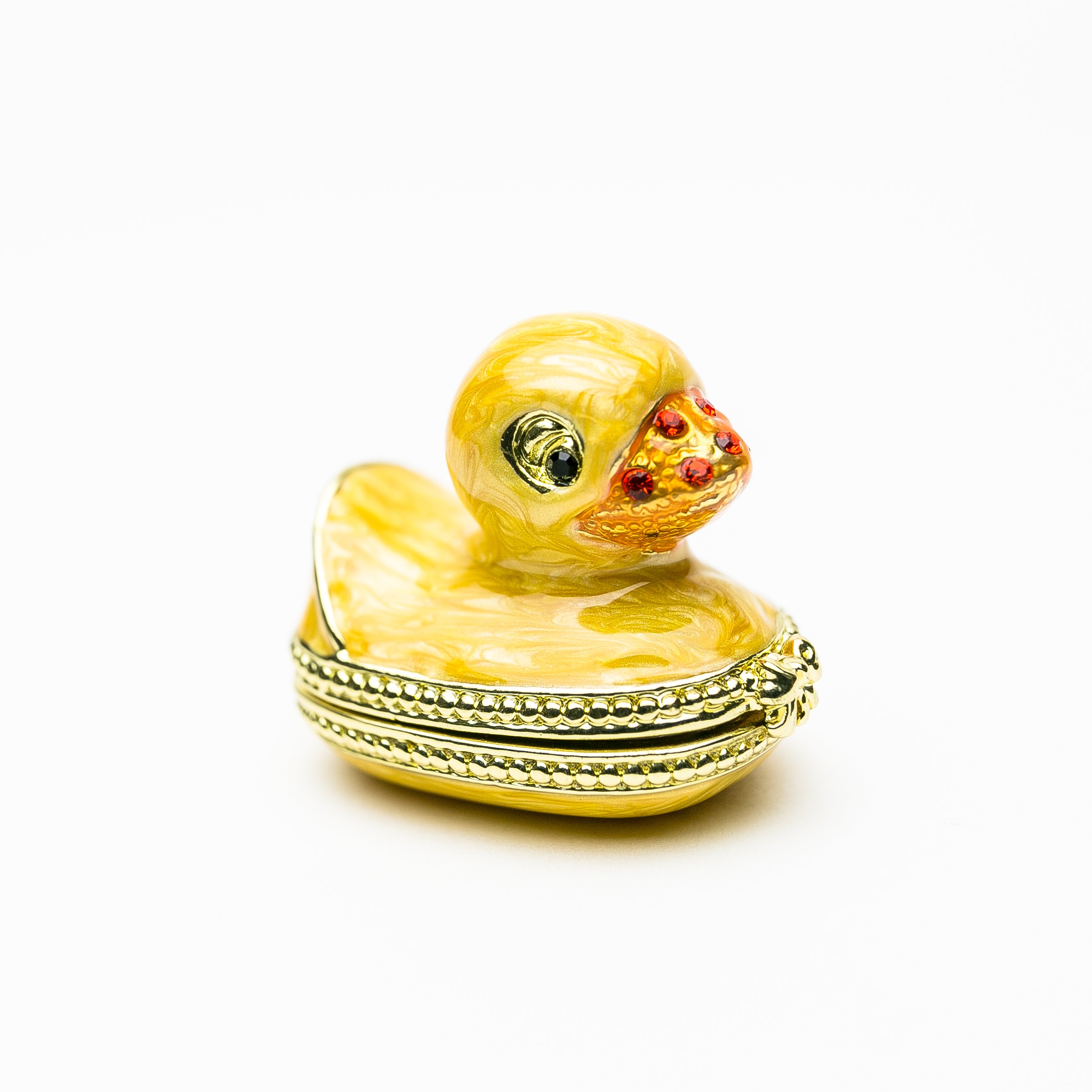 A charming yellow bath duck trinket box, handmade with 24K gold plating and adorned with sparkling Austrian crystals.