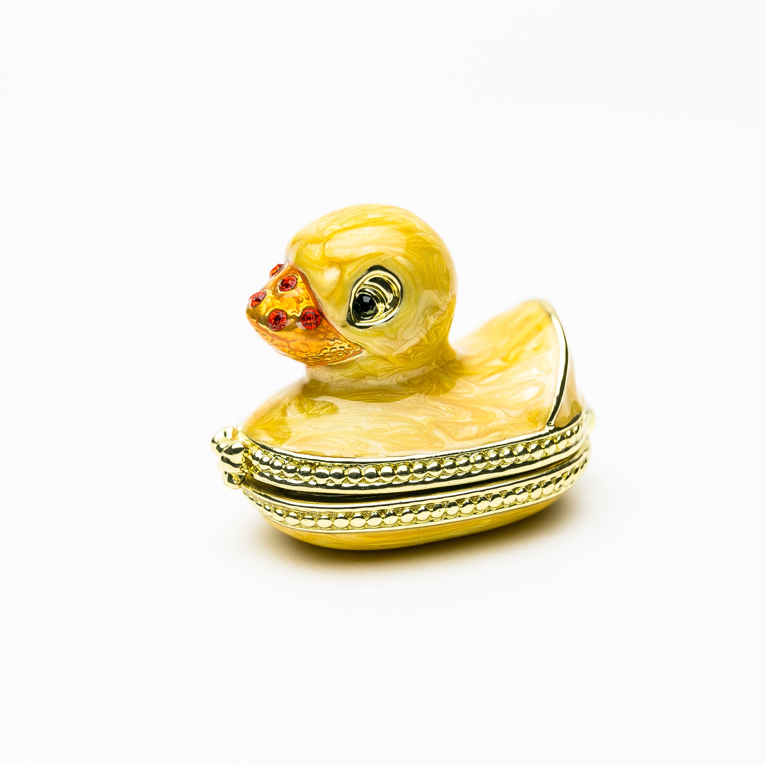 A charming yellow bath duck trinket box, handmade with 24K gold plating and adorned with sparkling Austrian crystals.