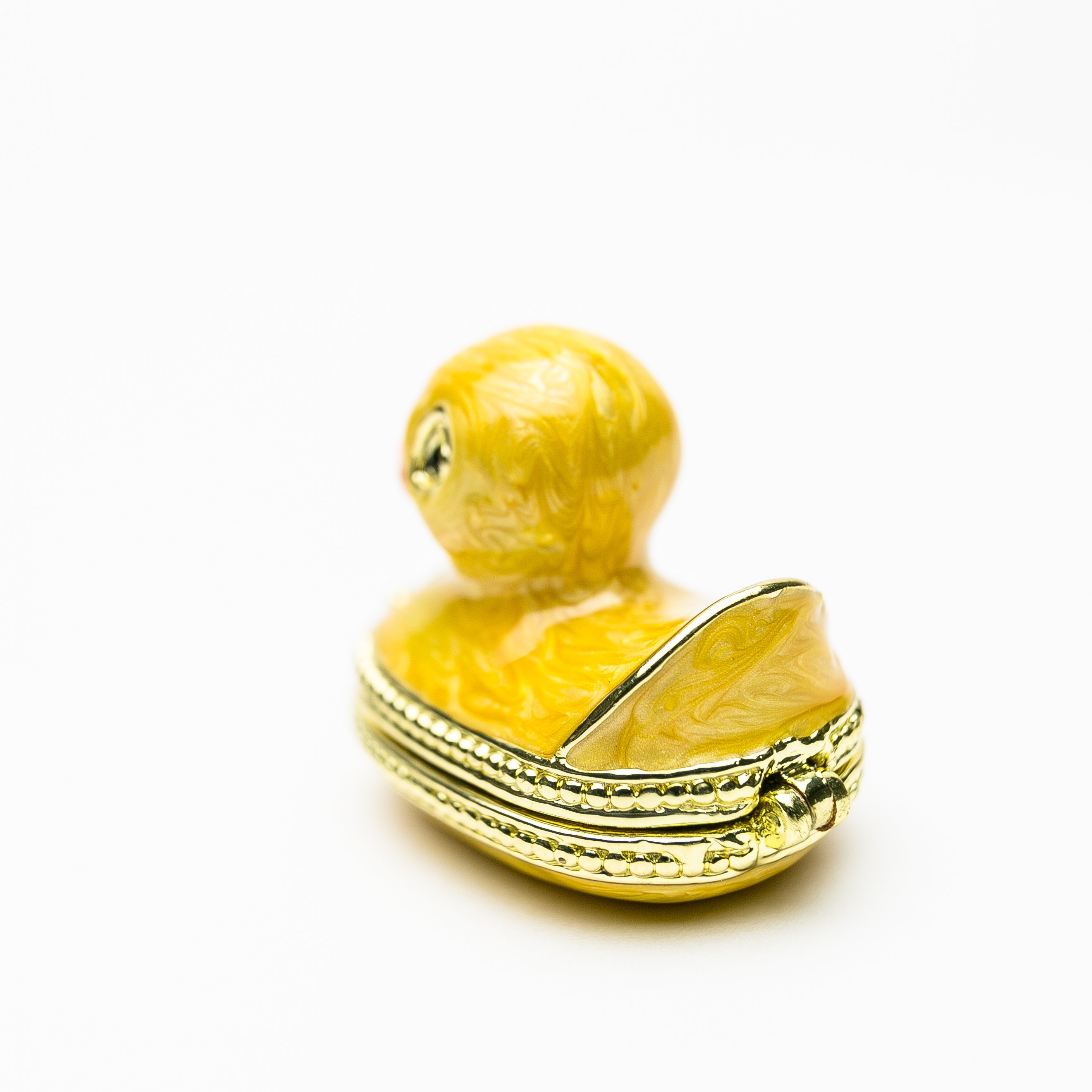 A charming yellow bath duck trinket box, handmade with 24K gold plating and adorned with sparkling Austrian crystals.