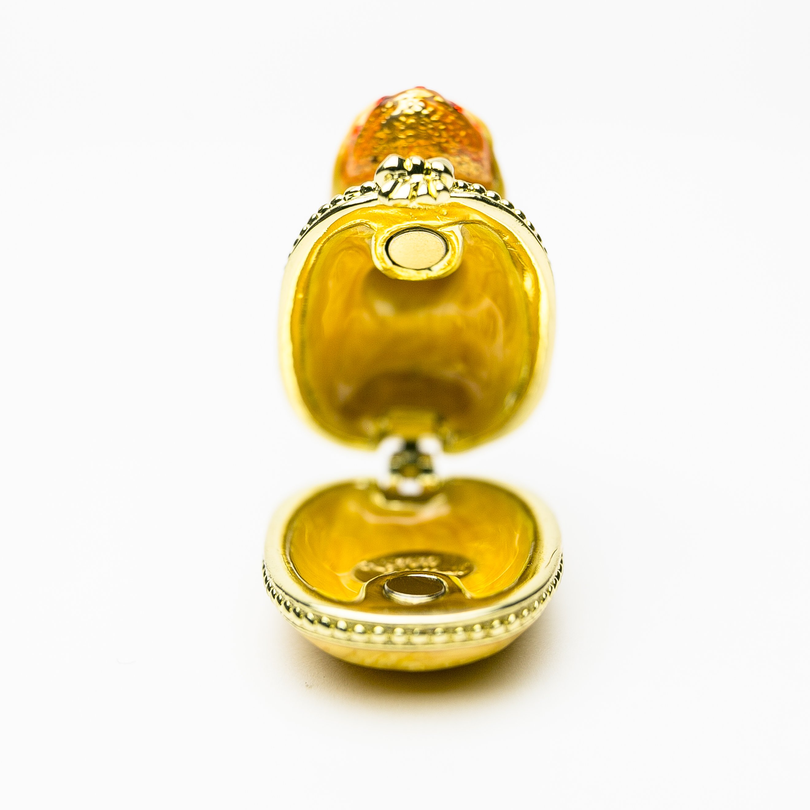 A charming yellow bath duck trinket box, handmade with 24K gold plating and adorned with sparkling Austrian crystals.