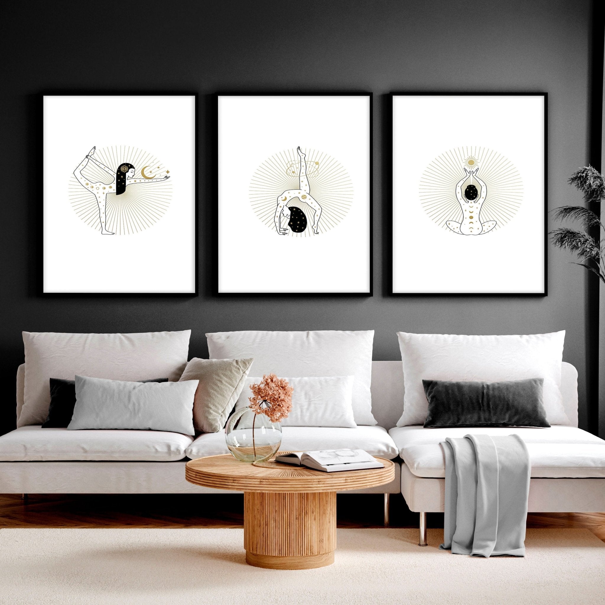 Set of 3 yoga wall art prints featuring elegant designs in black, white, and gold, perfect for enhancing any living space.