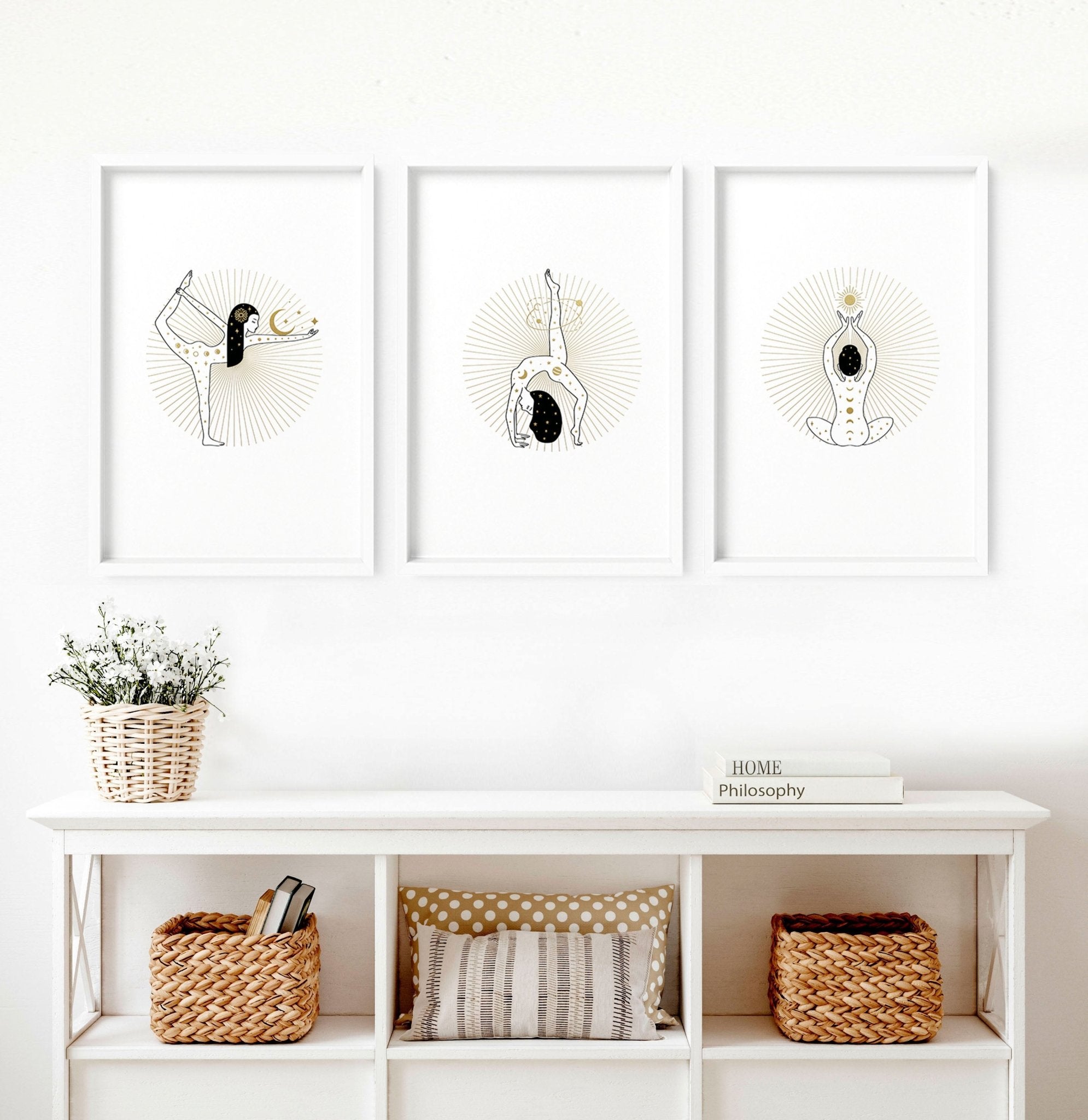 Set of 3 yoga wall art prints featuring elegant designs in black, white, and gold, perfect for enhancing any living space.