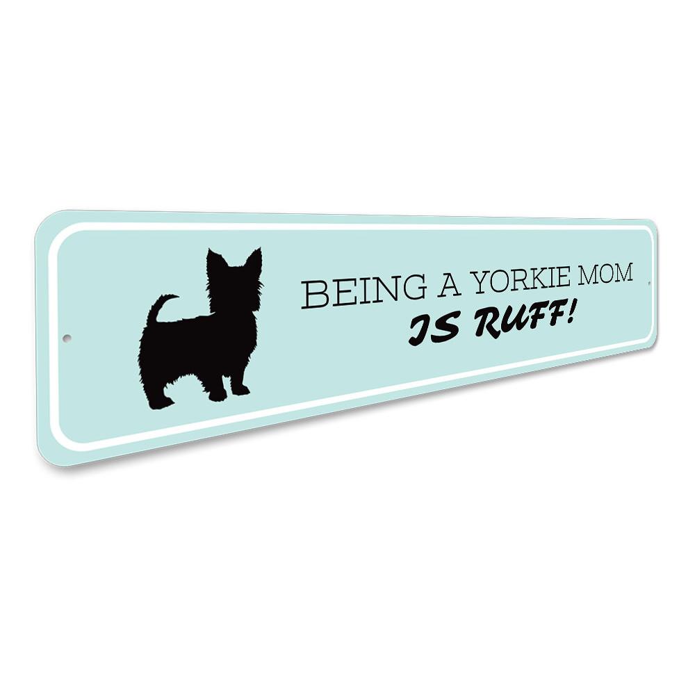 A decorative Yorkie Mom Sign made of high-quality aluminum, featuring a charming design perfect for dog lovers.