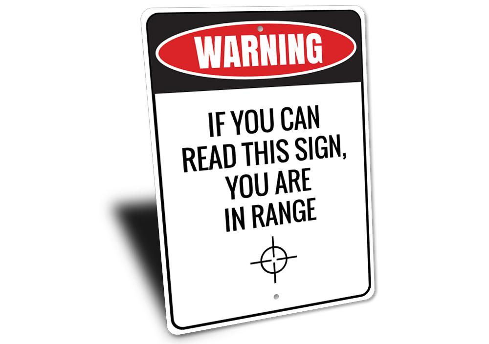 You Are in Range Sign made of high-quality aluminum, featuring customizable text and pre-drilled holes for easy mounting.