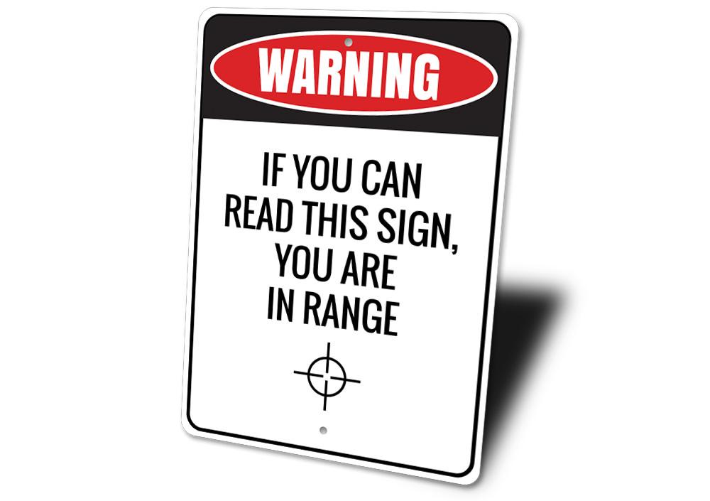 You Are in Range Sign made of high-quality aluminum, featuring customizable text and pre-drilled holes for easy mounting.