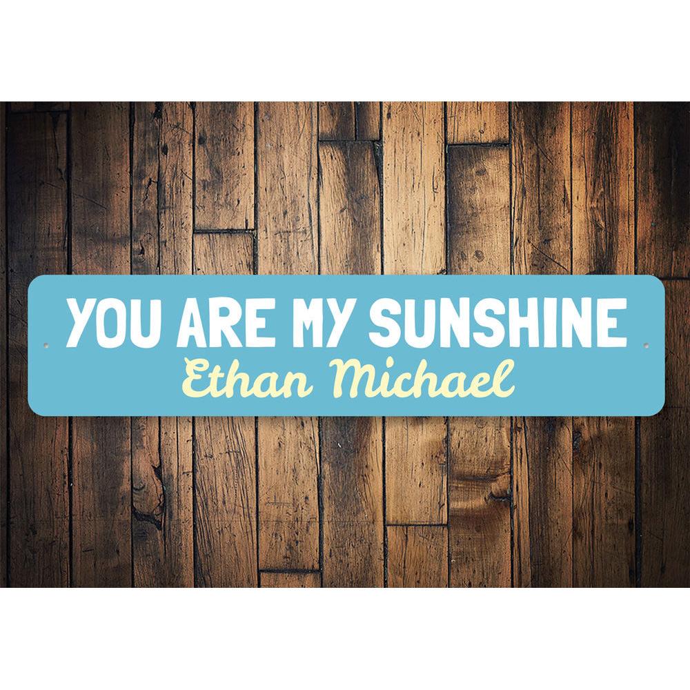 You Are My Sunshine Sign made of high-quality aluminum, featuring a bright and cheerful design perfect for children's rooms.