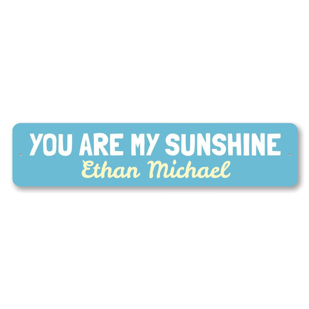 You Are My Sunshine Sign made of high-quality aluminum, featuring a bright and cheerful design perfect for children's rooms.