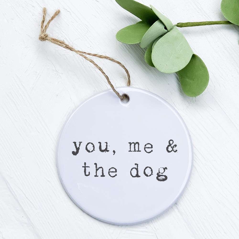 A beautifully designed porcelain ornament featuring the phrase 'You, Me and...' with a smooth glossy finish, perfect for gifting.