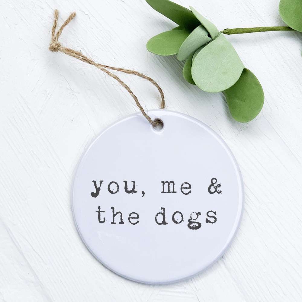 A beautifully designed porcelain ornament featuring the phrase 'You, Me and...' with a smooth glossy finish, perfect for gifting.