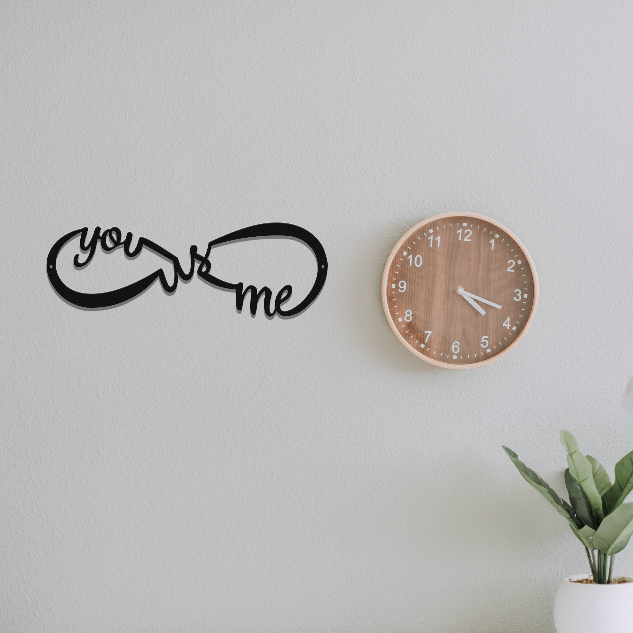 You Me and Us Infinity Metal Wall Art in black, showcasing an elegant infinity design symbolizing love and connection.