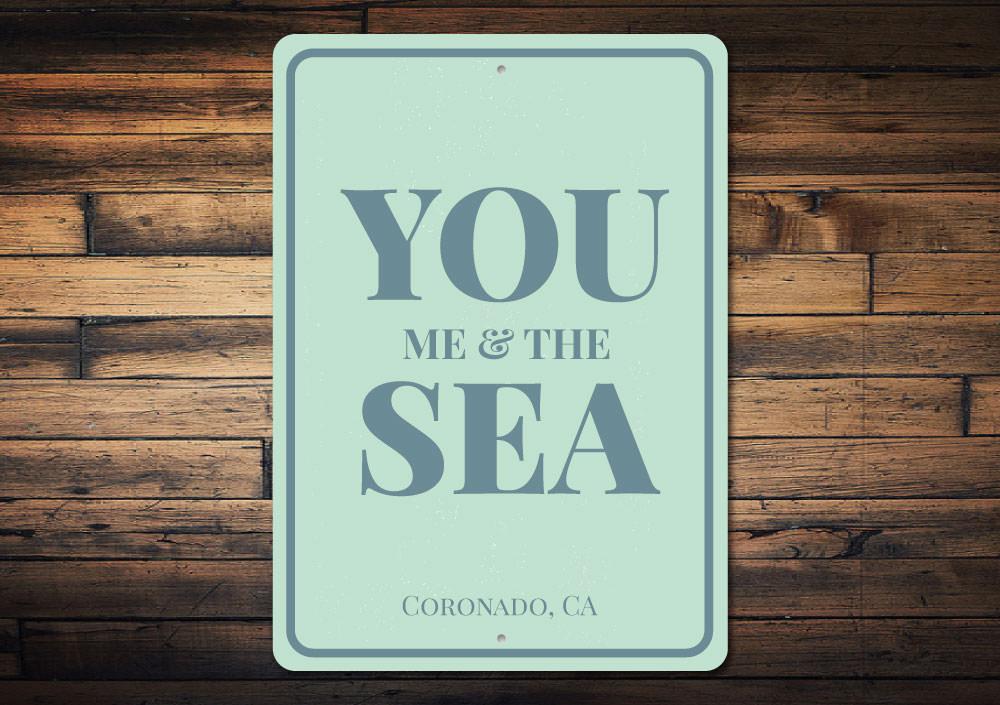 You Me & The Sea Sign made of high-quality aluminum, featuring a beach-themed design perfect for coastal decor.