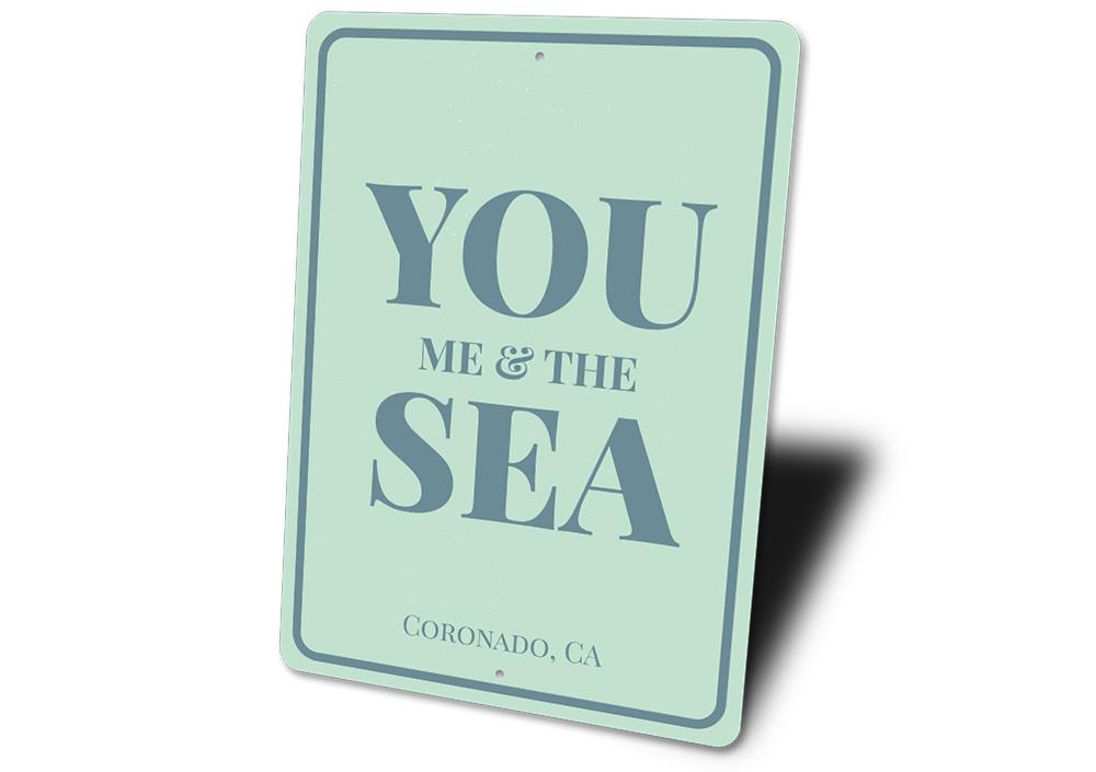 You Me & The Sea Sign made of high-quality aluminum, featuring a beach-themed design perfect for coastal decor.