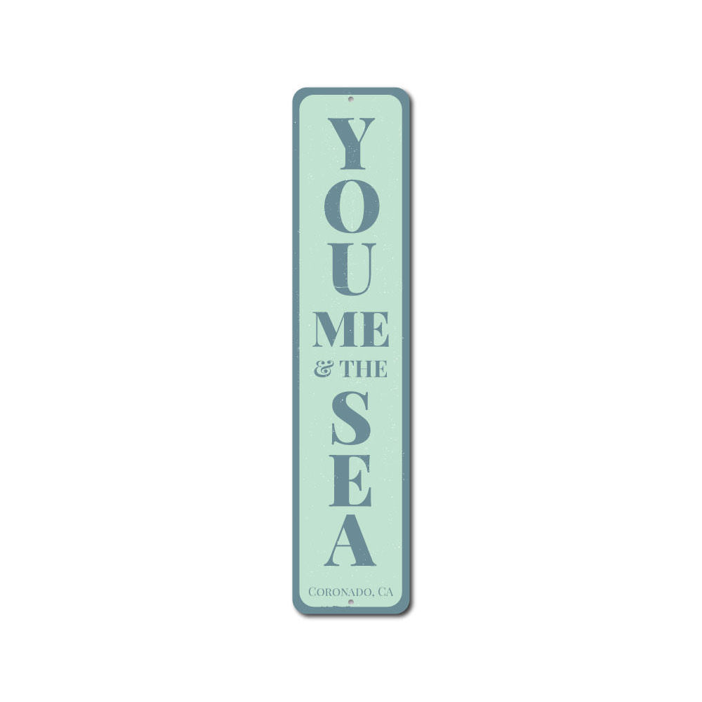 You Me & The Sea Vertical Sign made of durable aluminum, featuring a coastal design perfect for home decor.