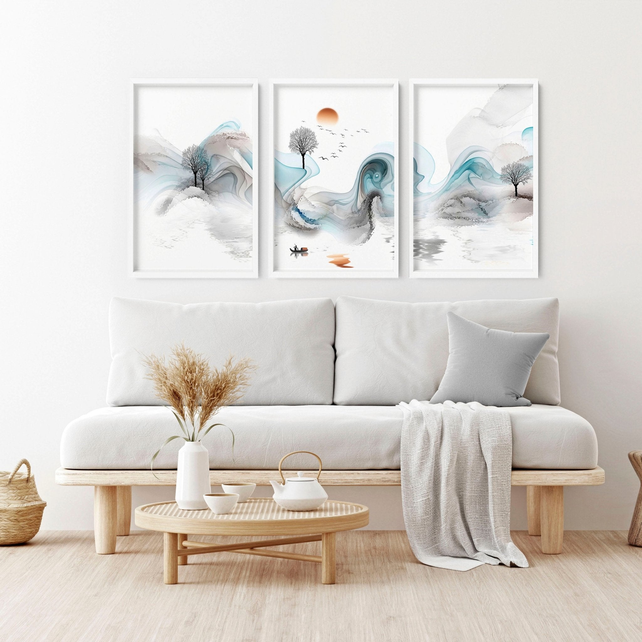 Set of 3 Zen wall art prints featuring ethereal Japanese landscapes, perfect for creating a serene atmosphere in your living room.