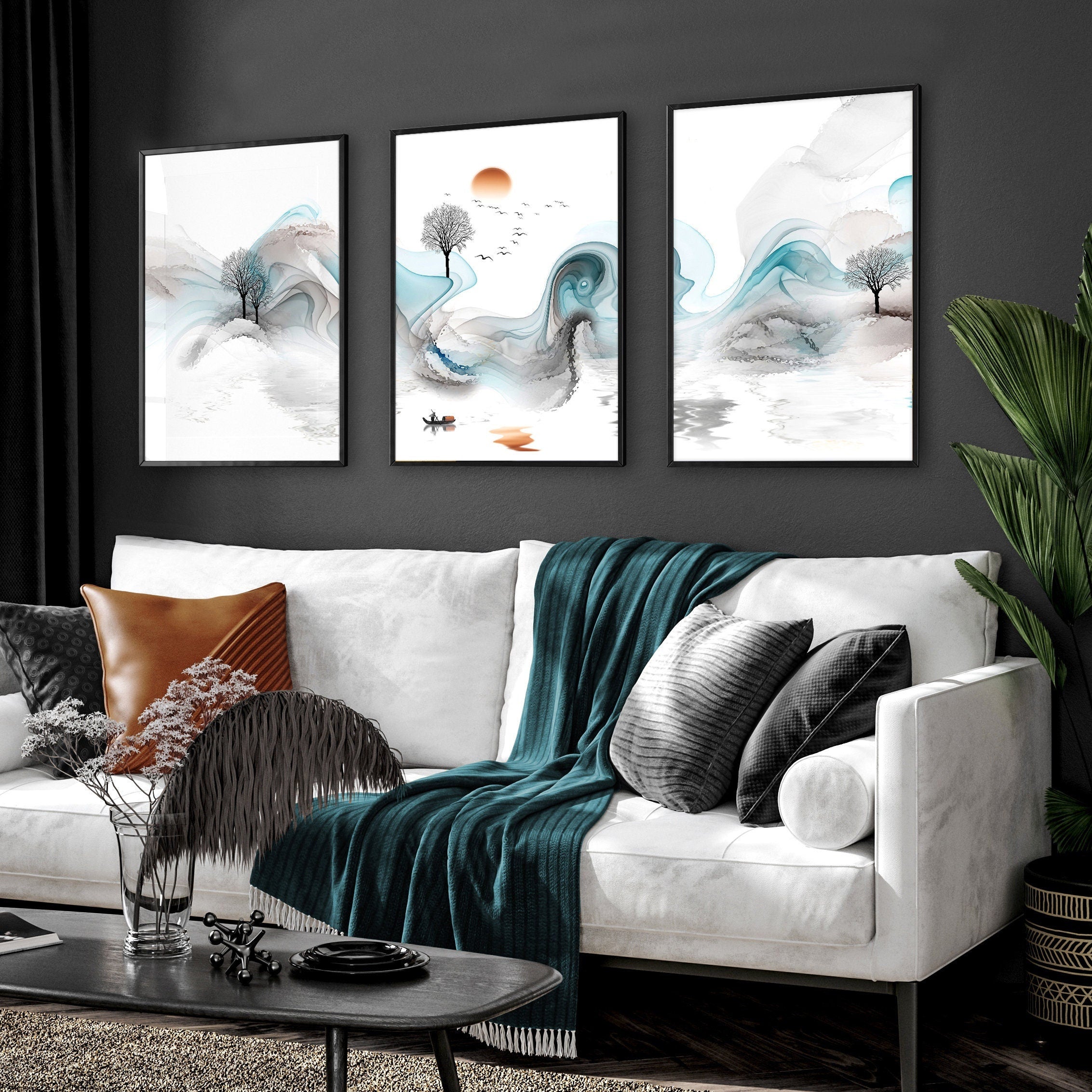 Set of 3 Zen wall art prints featuring ethereal Japanese landscapes, perfect for creating a serene atmosphere in your living room.