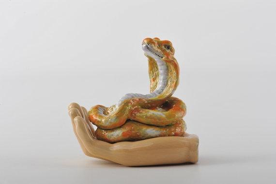 Handcrafted Zodiac Snake Laying on Hand Trinket Box with Austrian crystals and 925 silver plating, elegantly designed for art lovers.