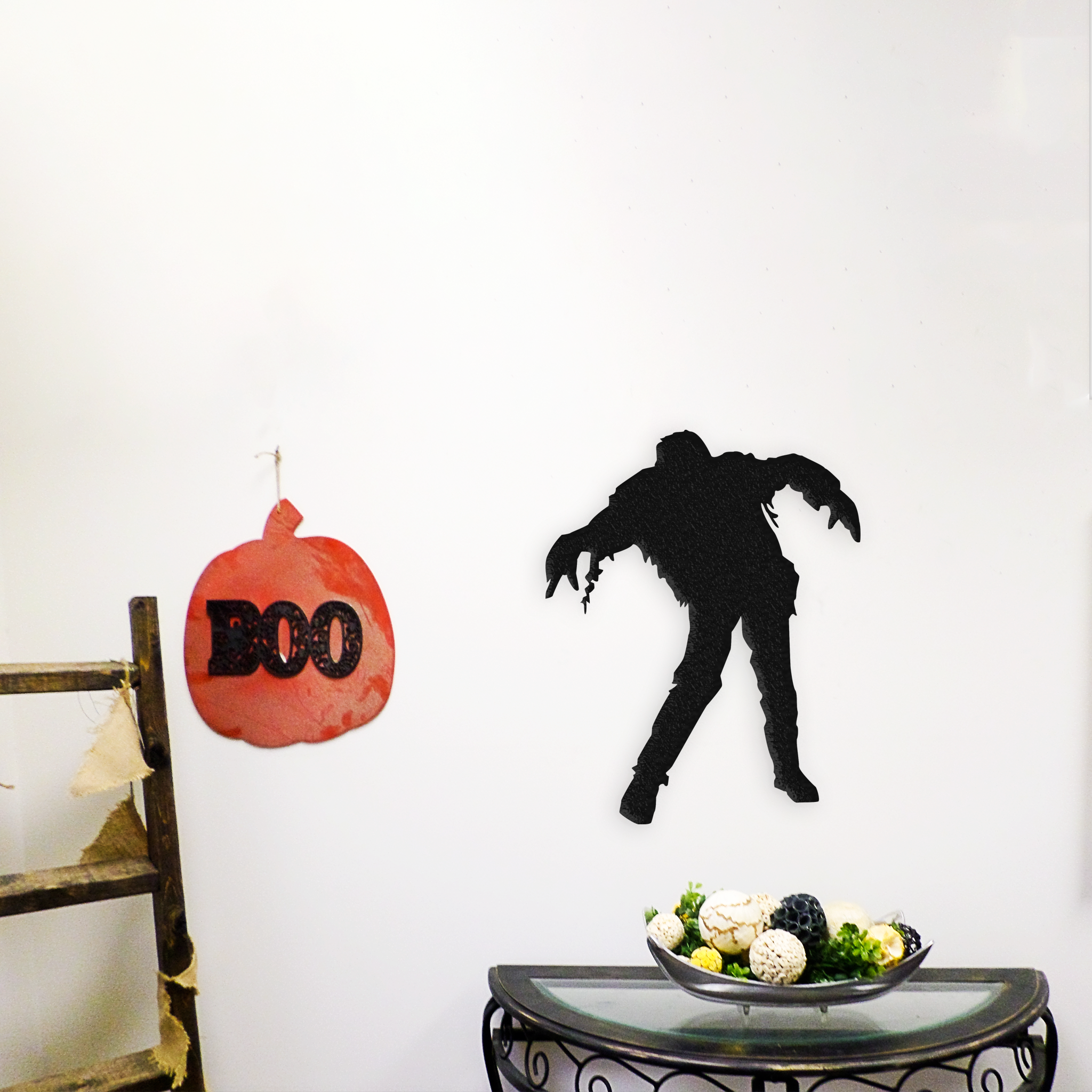 Zombie Metal Wall Art featuring intricate design, crafted from high-quality steel with a low gloss powder-coated finish, perfect for Halloween decor.