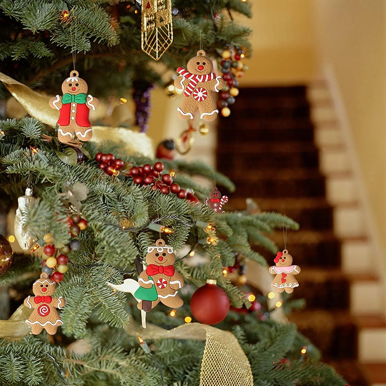 A colorful assortment of 12 Gingerbread Man ornaments made of durable plastic, perfect for Christmas tree decoration.