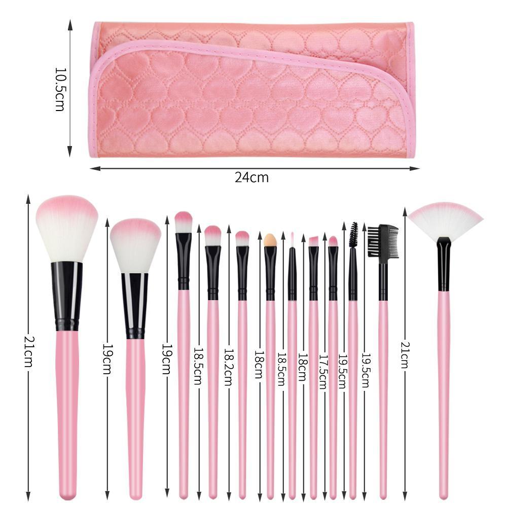 A set of 12 professional makeup brushes with wooden handles and vegan-friendly bristles, displayed in a stylish carrying bag.