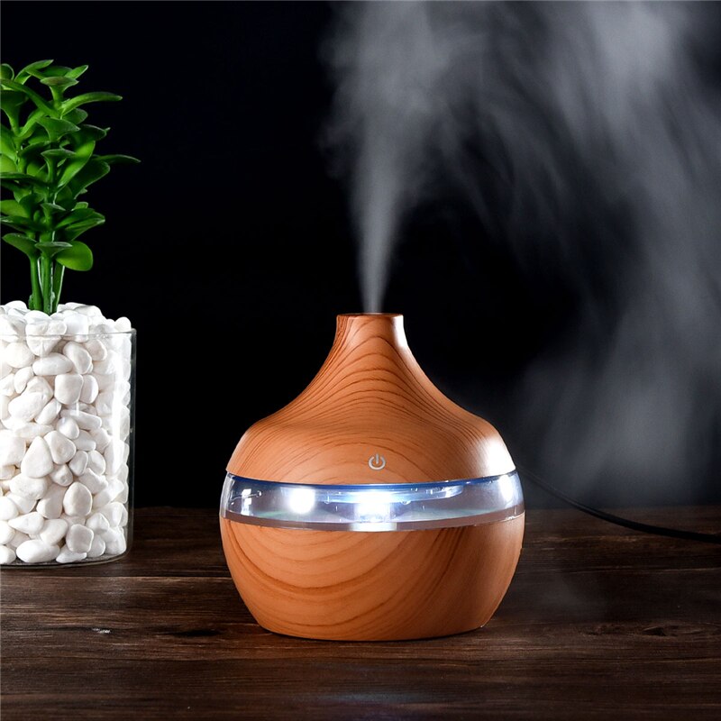 300ml USB Electric Ultrasonic Aromatherapy Air Humidifier with wood grain finish and 7 color LED lights, ideal for home and office use.