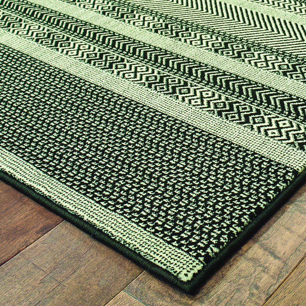 8-inch Black Ivory Machine Woven Geometric Indoor Runner Rug featuring intricate ivory stripes on a black background, perfect for high traffic areas.