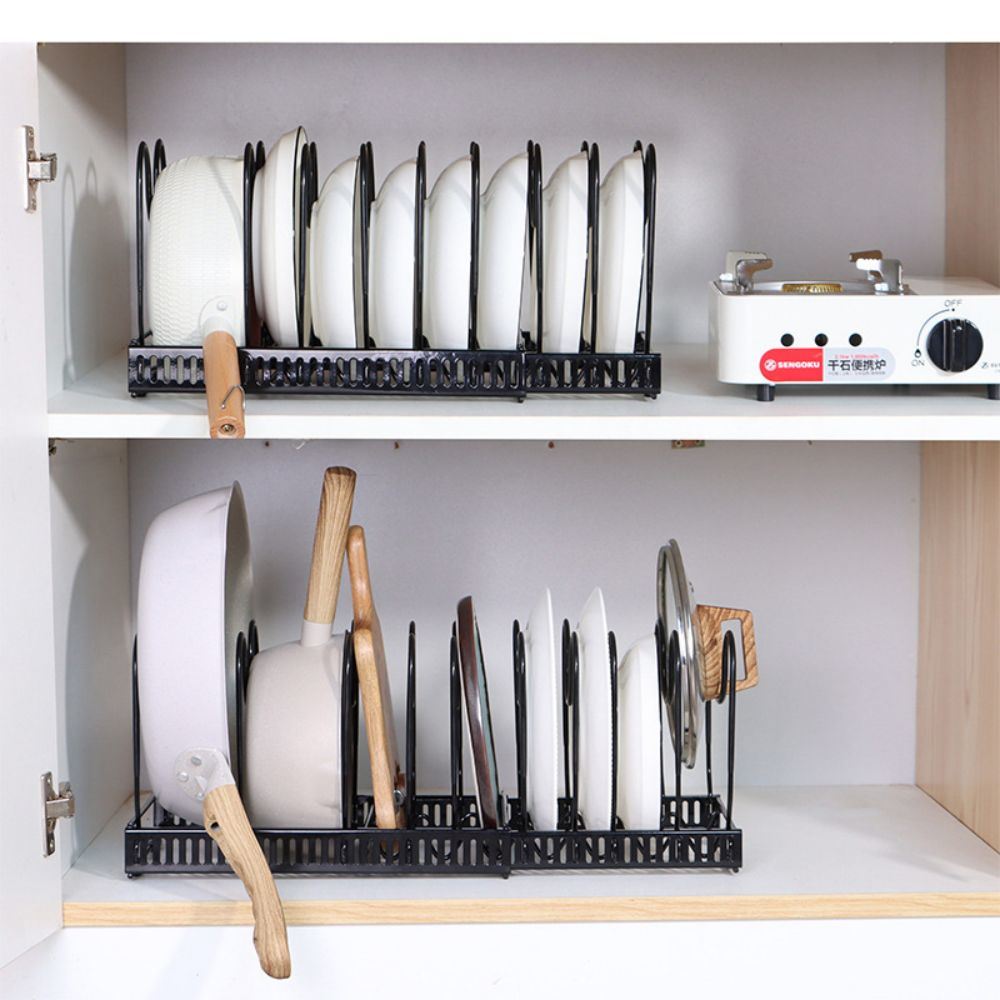 Adjustable kitchen pot rack with pots, lids, and cutting boards organized neatly.