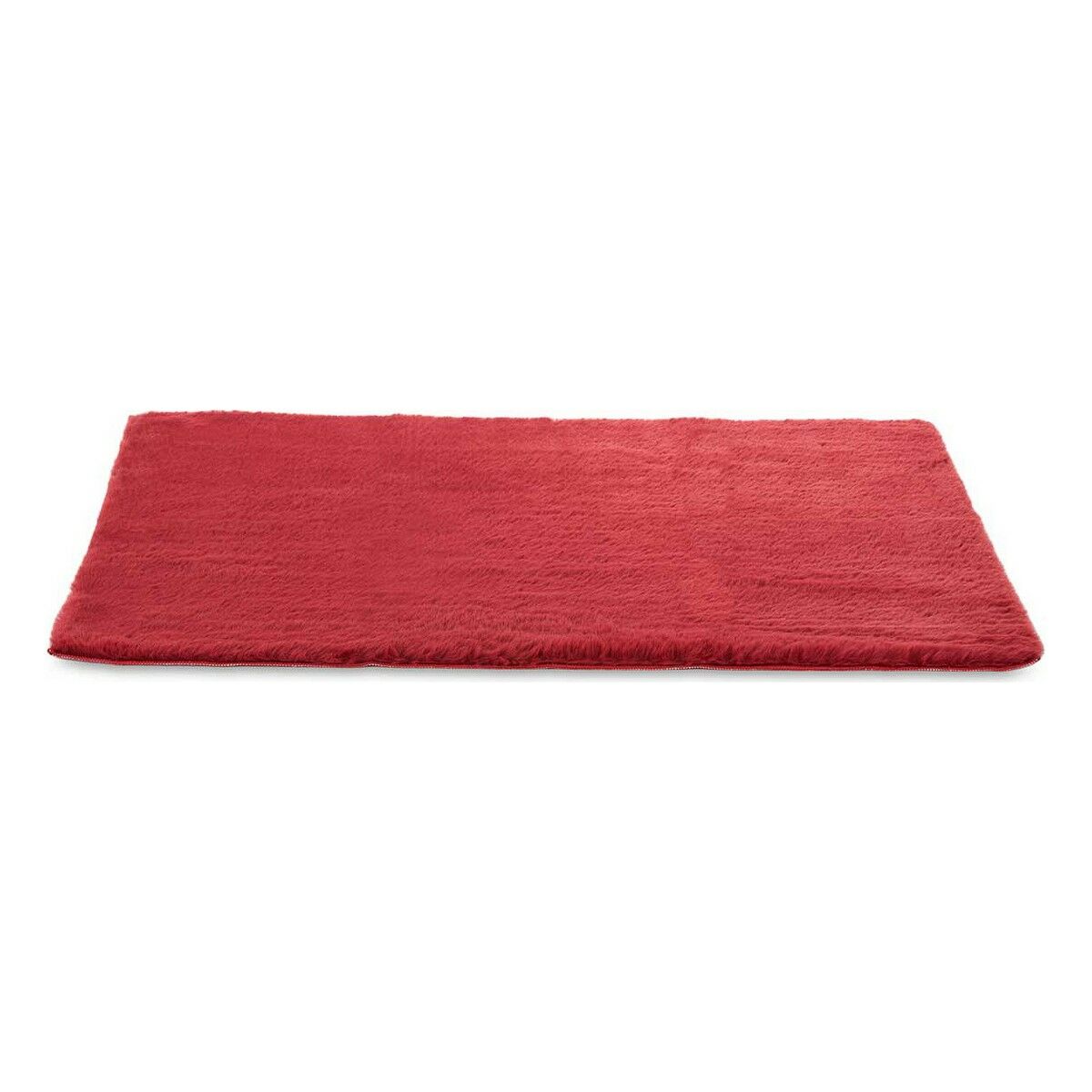 Red rectangular plush rug.