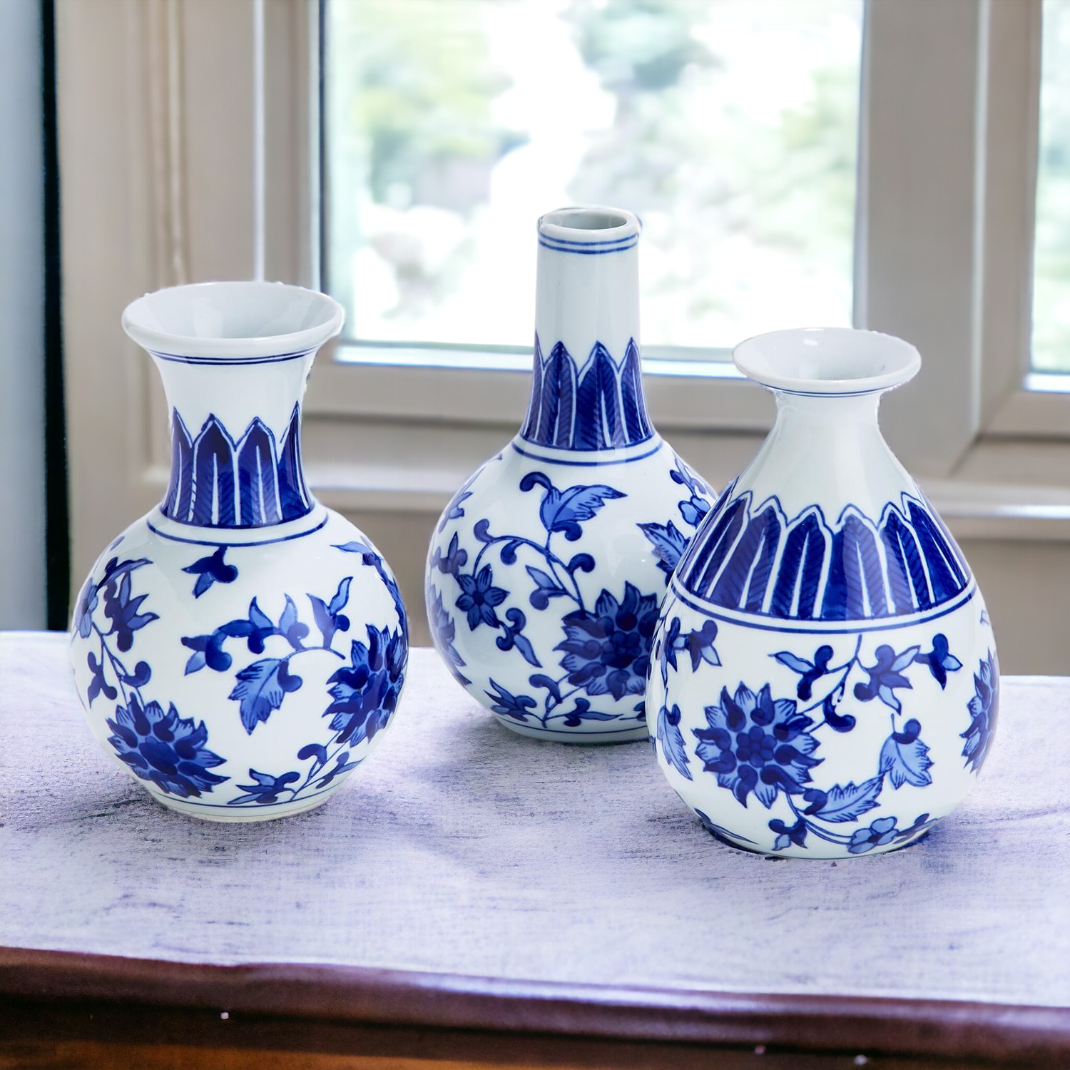 Elegant Chinoiserie Mediterranean Canton Vases in blue and white, showcasing intricate hand-painted designs, perfect for home decor.