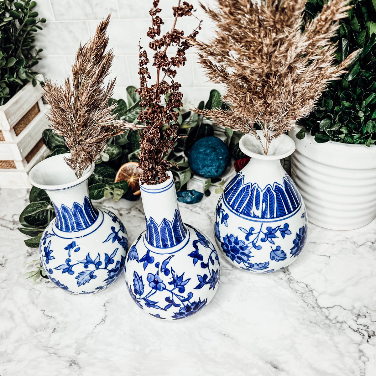 Elegant Chinoiserie Mediterranean Canton Vases in blue and white, showcasing intricate hand-painted designs, perfect for home decor.