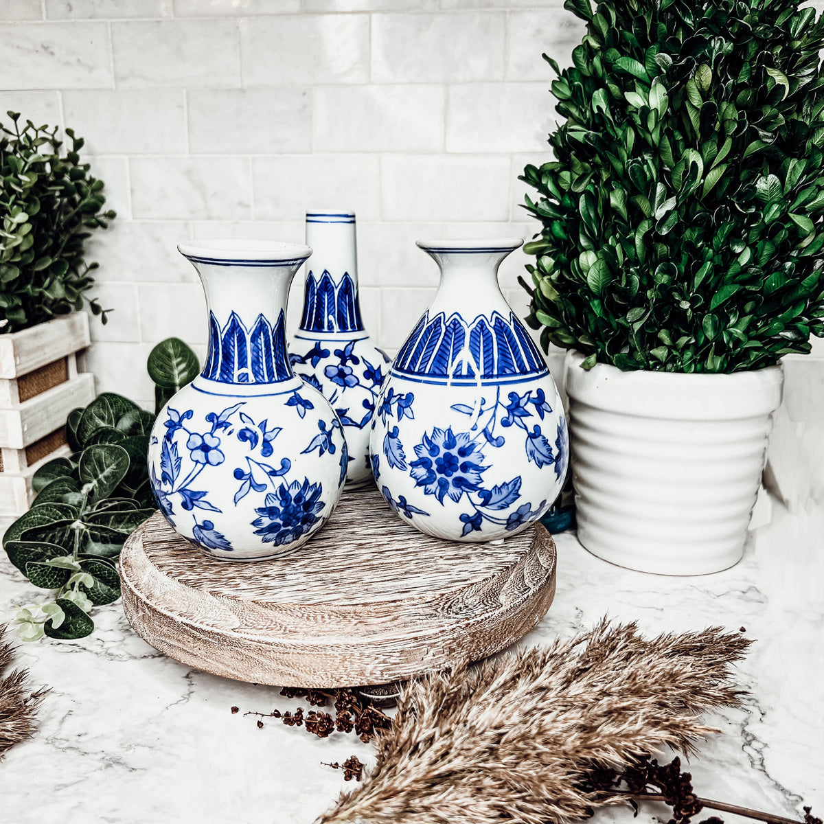 Elegant Chinoiserie Mediterranean Canton Vases in blue and white, showcasing intricate hand-painted designs, perfect for home decor.