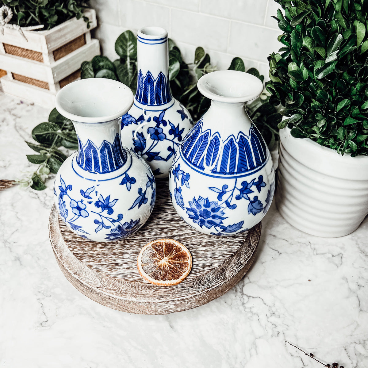 Elegant Chinoiserie Mediterranean Canton Vases in blue and white, showcasing intricate hand-painted designs, perfect for home decor.