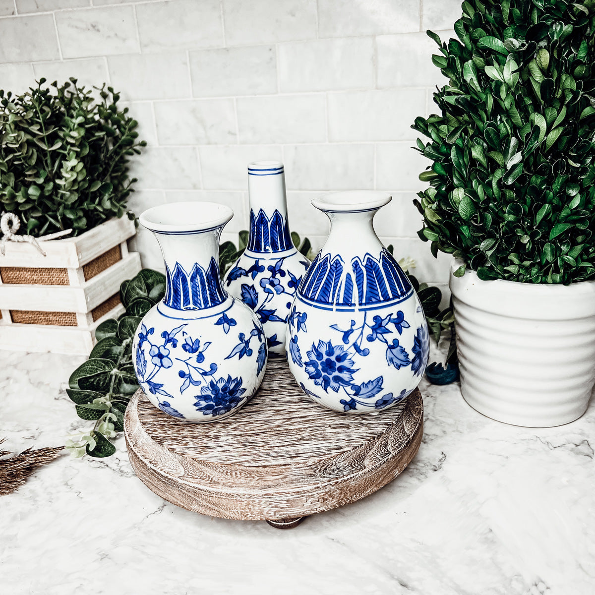 Elegant Chinoiserie Mediterranean Canton Vases in blue and white, showcasing intricate hand-painted designs, perfect for home decor.